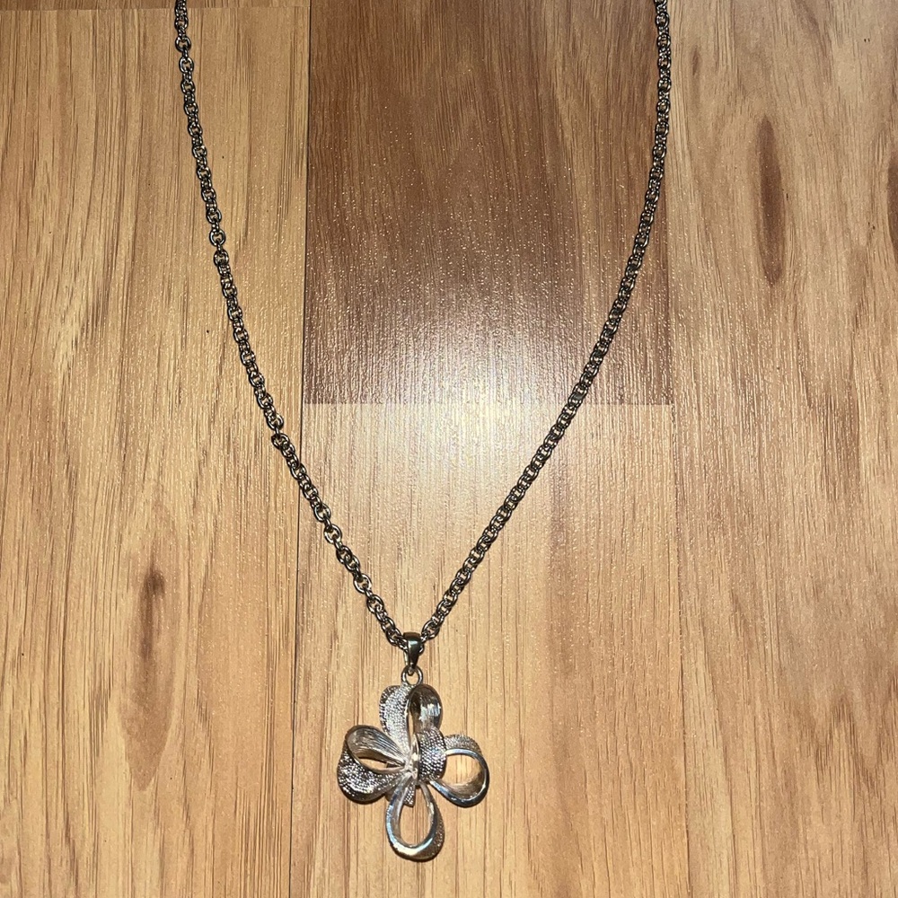 Unique Silver Necklace with Shiny Bow